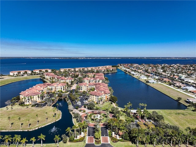 drone / aerial view with a water view