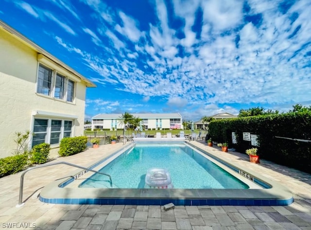 view of pool with a patio