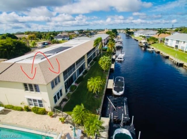 bird's eye view with a water view