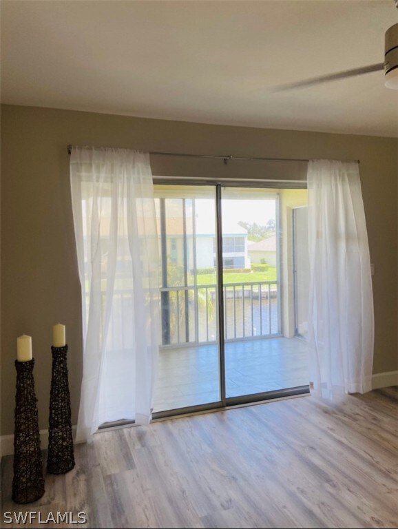 empty room with light hardwood / wood-style floors