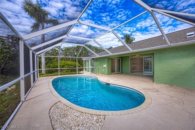 view of pool featuring a lanai and a patio area