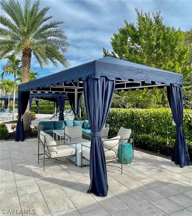 view of patio / terrace featuring a gazebo and an outdoor living space