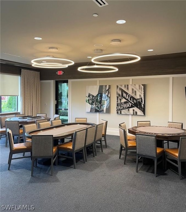 view of carpeted dining space