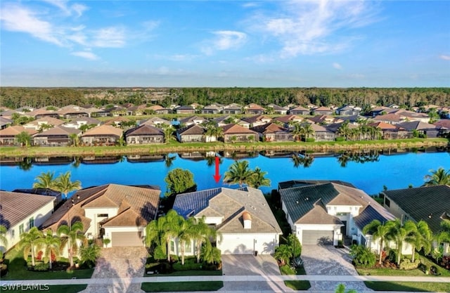 drone / aerial view featuring a water view