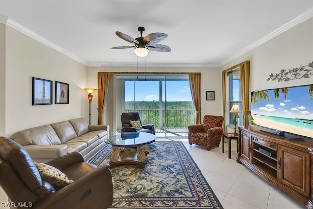 tiled living room with ornamental molding and ceiling fan