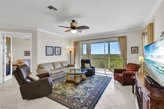 tiled living room featuring ornamental molding and ceiling fan