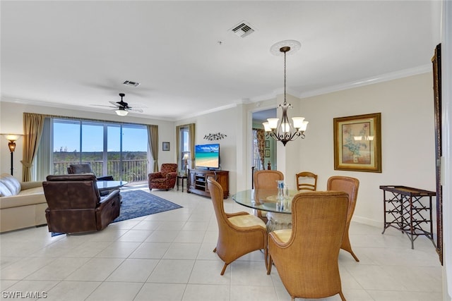 dining area with light tile flooring, ornamental molding, and ceiling fan with notable chandelier