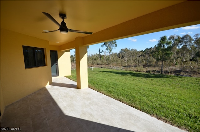 view of patio / terrace featuring ceiling fan