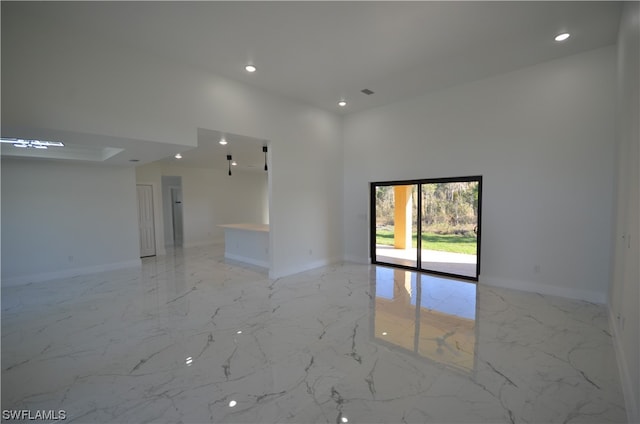 empty room with light tile flooring