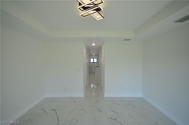 unfurnished room featuring light tile flooring