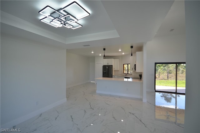 kitchen with white cabinetry, black fridge with ice dispenser, pendant lighting, and light tile floors