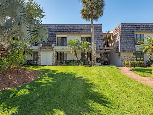 view of front of house with a front lawn