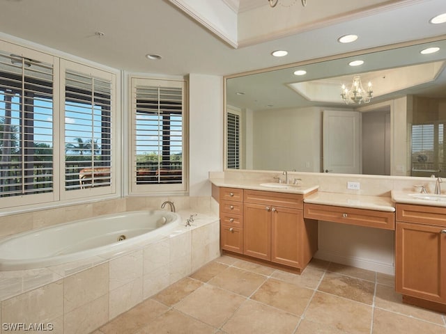 full bathroom with double vanity, a raised ceiling, a tub with jets, and a sink