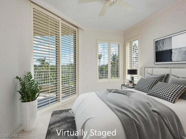 bedroom with baseboards, a ceiling fan, ornamental molding, access to outside, and carpet floors