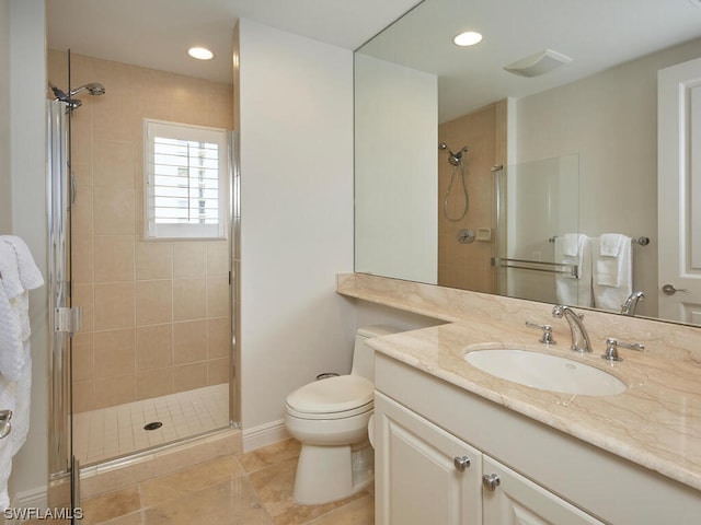 bathroom featuring walk in shower, tile flooring, oversized vanity, and toilet