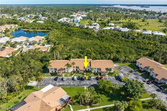 bird's eye view with a residential view and a water view