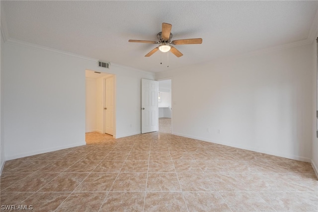 spare room featuring a textured ceiling, ceiling fan, crown molding, and light tile patterned floors