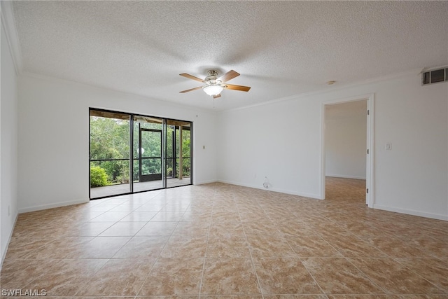 tiled spare room featuring ceiling fan, ornamental molding, and a textured ceiling