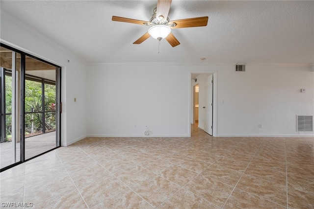 tiled empty room featuring a textured ceiling, ceiling fan, and crown molding