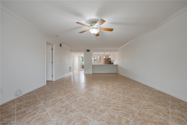 spare room featuring ceiling fan with notable chandelier, light tile patterned flooring, a textured ceiling, and crown molding