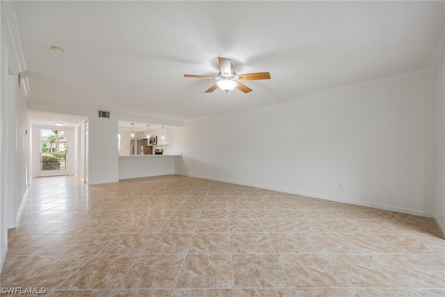 unfurnished living room featuring ceiling fan, ornamental molding, a textured ceiling, and light tile patterned floors