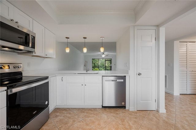 kitchen with appliances with stainless steel finishes, ceiling fan, sink, white cabinetry, and decorative light fixtures