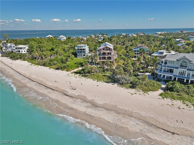 aerial view with a view of the beach and a water view