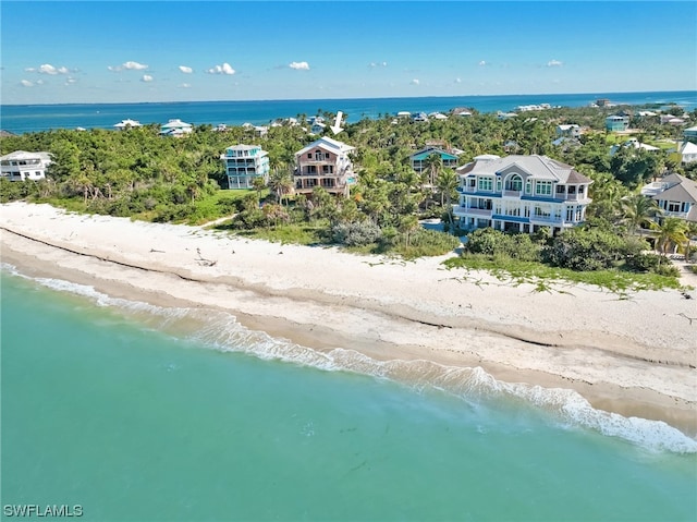 bird's eye view with a view of the beach and a water view