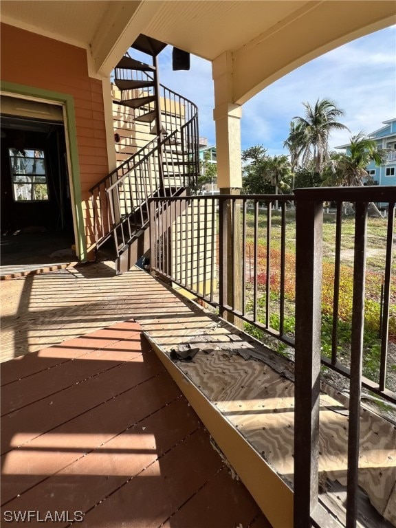 wooden balcony featuring a deck