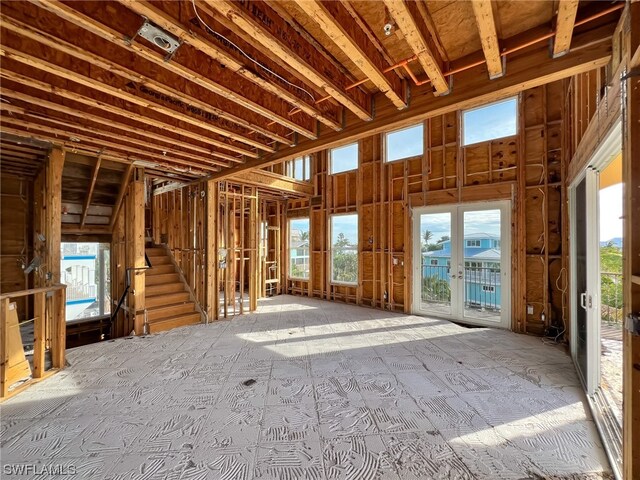 misc room featuring a healthy amount of sunlight and french doors