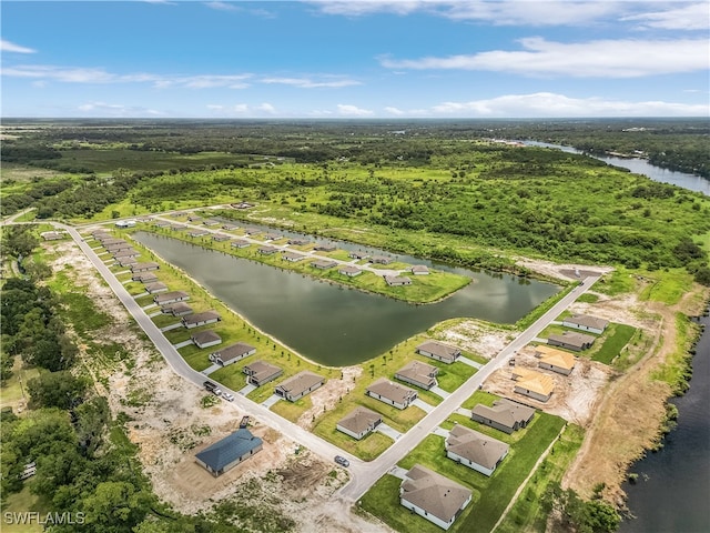 bird's eye view with a water view