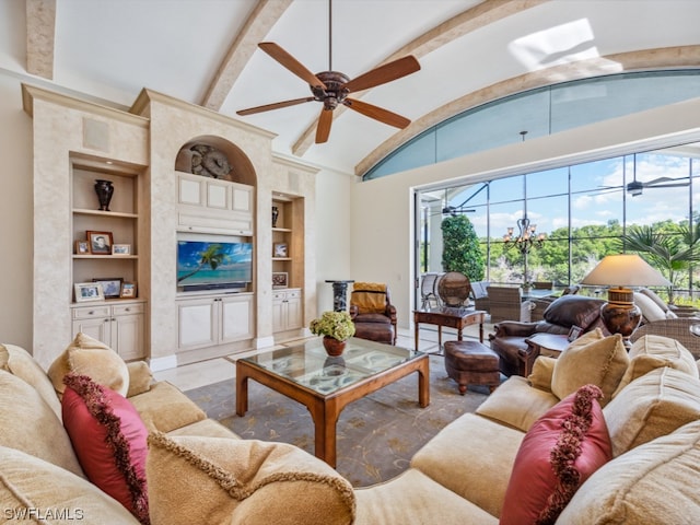 living room featuring ceiling fan, built in features, beamed ceiling, and high vaulted ceiling