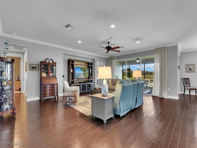 living room featuring ornamental molding, dark hardwood / wood-style floors, and ceiling fan