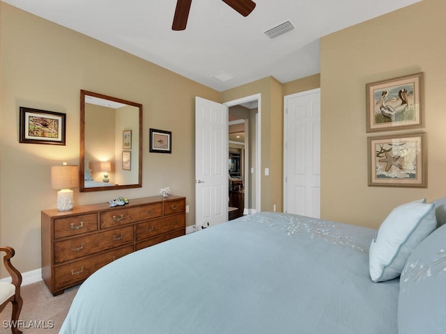 carpeted bedroom with ceiling fan