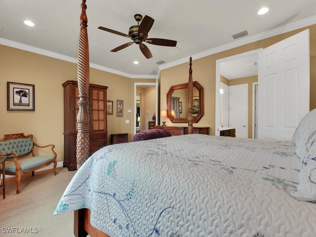 carpeted bedroom with ornamental molding and ceiling fan