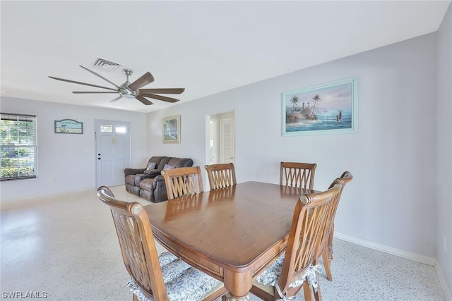 dining space featuring ceiling fan