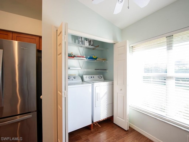 laundry area featuring ceiling fan, dark hardwood / wood-style floors, and washing machine and dryer