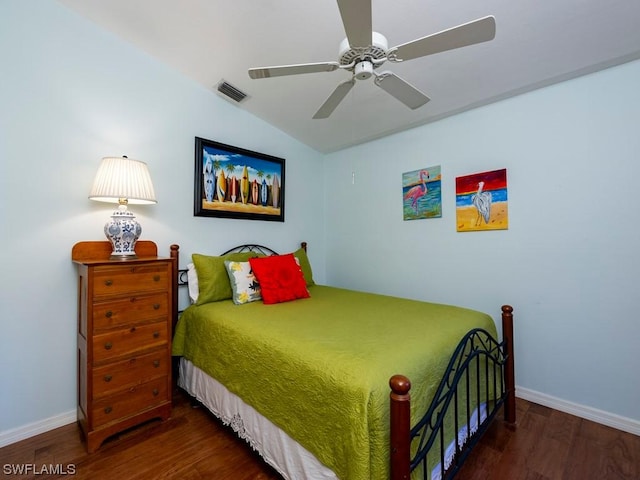 bedroom with dark wood-type flooring and ceiling fan