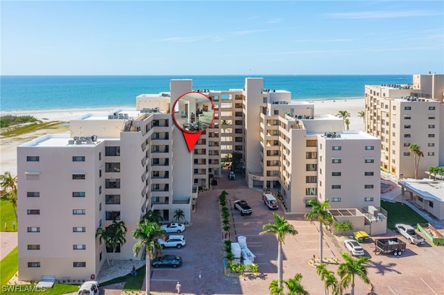 6672 Estero Blvd Unit A409, Fort Myers Beach, FL 33931 - birds eye view of property featuring a water view and a beach view