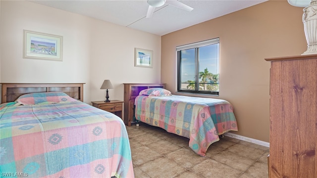 6672 Estero Blvd Unit A409, Fort Myers Beach, FL 33931 - bedroom with ceiling fan