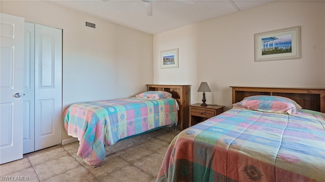 6672 Estero Blvd Unit A409, Fort Myers Beach, FL 33931 - bedroom featuring ceiling fan and a closet