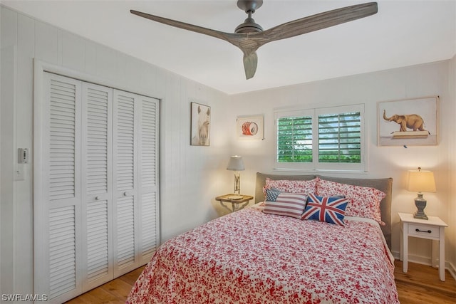 bedroom featuring a closet, ceiling fan, and wood finished floors