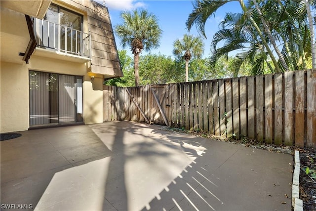 view of patio with a balcony