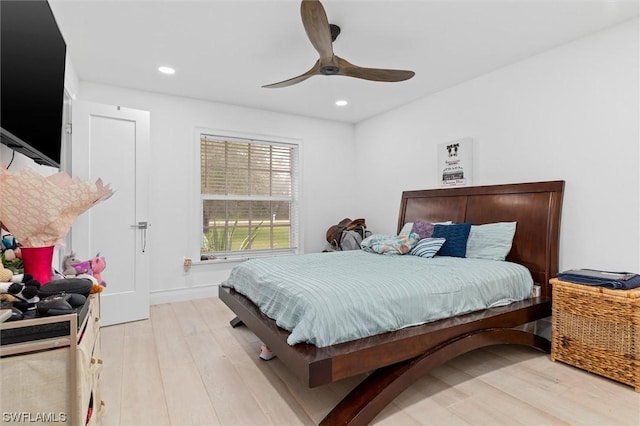 bedroom featuring ceiling fan and light wood-type flooring