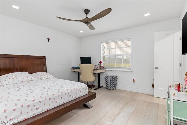 bedroom featuring ceiling fan and light hardwood / wood-style floors