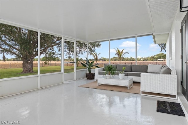 unfurnished sunroom featuring a wealth of natural light