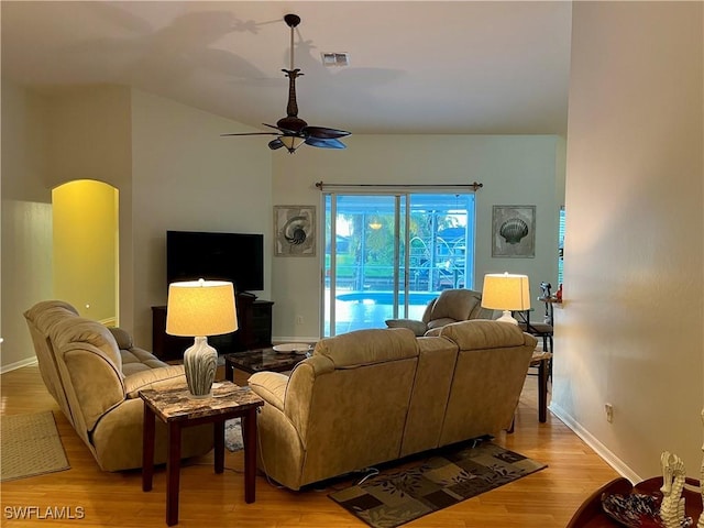 living room with ceiling fan and light hardwood / wood-style floors