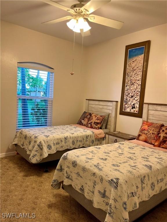 bedroom with carpet floors and ceiling fan