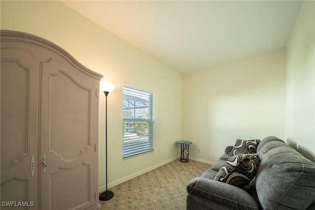 sitting room with light colored carpet