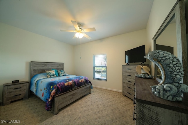 bedroom featuring ceiling fan and light colored carpet